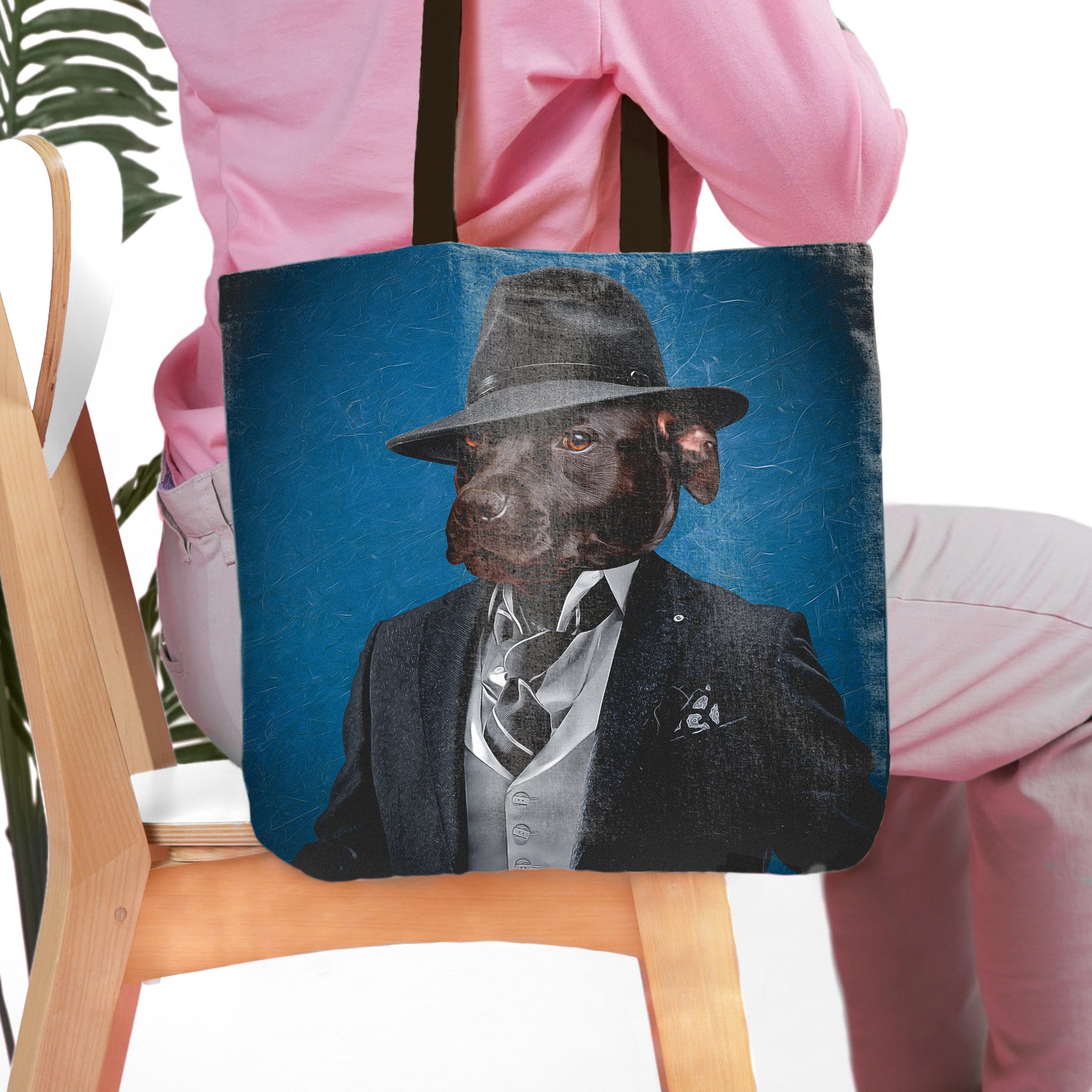 Personalized 'Mobster' tote bag with a custom dog portrait in a suit and fedora on a blue background.