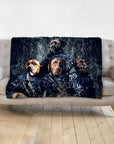 Personalized 4-pet blanket featuring dogs in navy veteran portraits, draped on a light gray sofa.