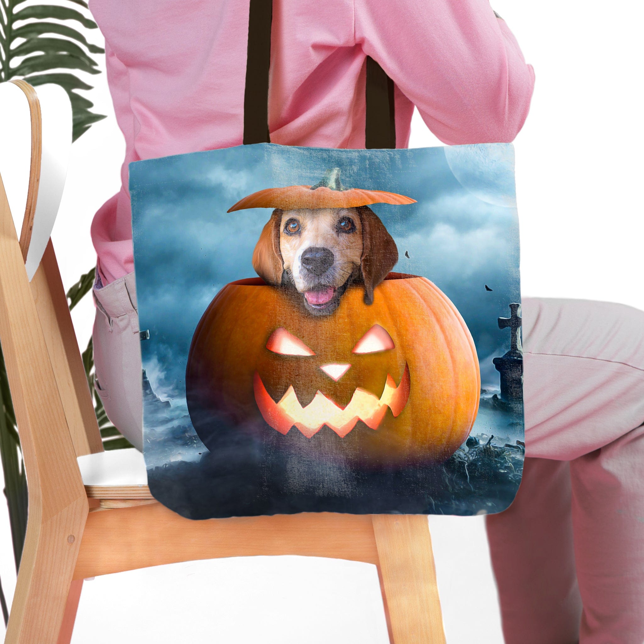 Personalized Pawmpkin Halloween tote bag with a custom dog portrait inside a jack-o'-lantern.