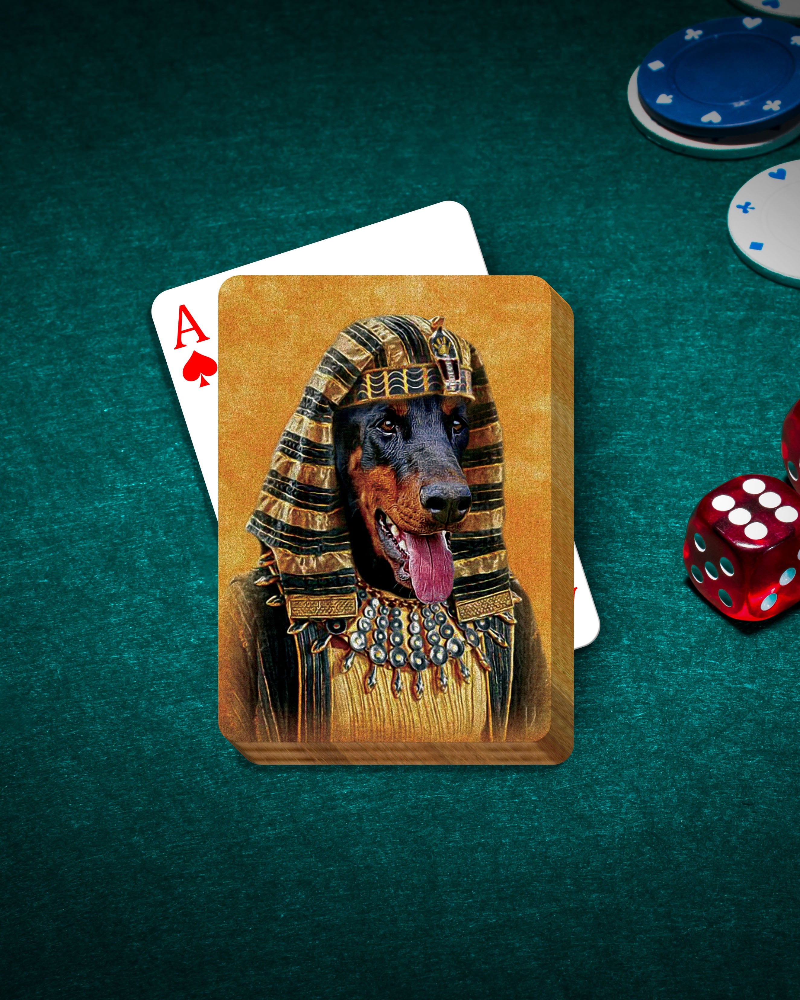 Personalized playing cards featuring a Doberman pet portrait in a Pharaoh costume on a green felt table.
