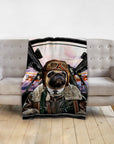 Personalized pet blanket featuring a pug in a pilot's uniform, draped over a gray sofa.