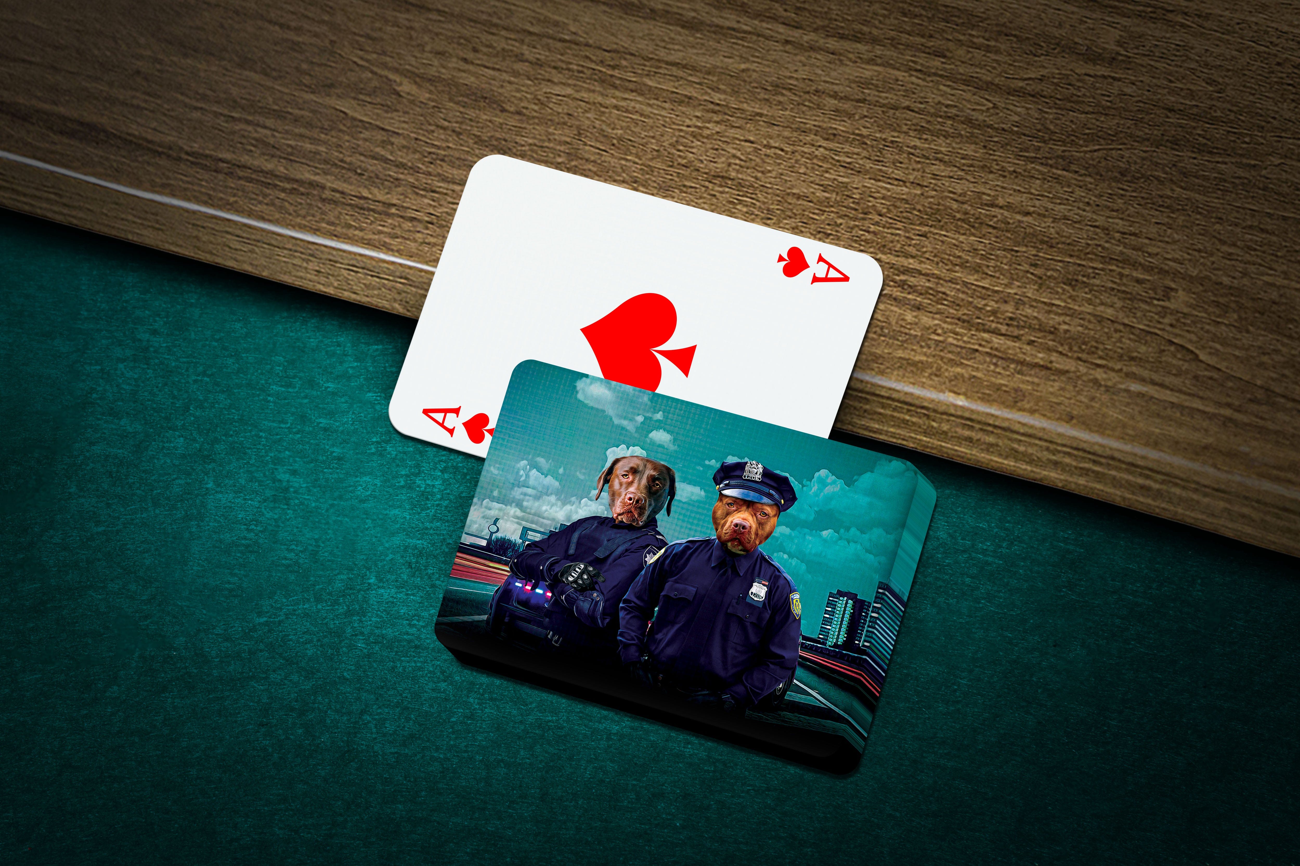 Personalized playing cards featuring two dogs in police officer uniforms on a green felt table.