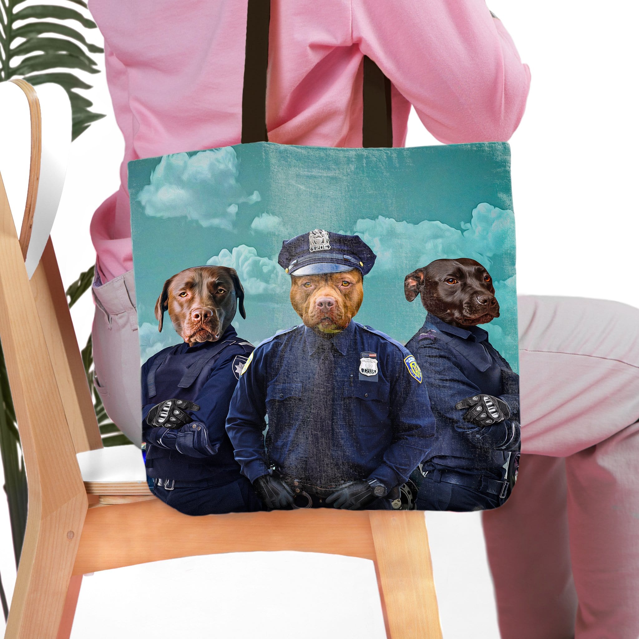 Personalized 3-pet tote bag featuring dogs in police officer uniforms against a cloudy sky.