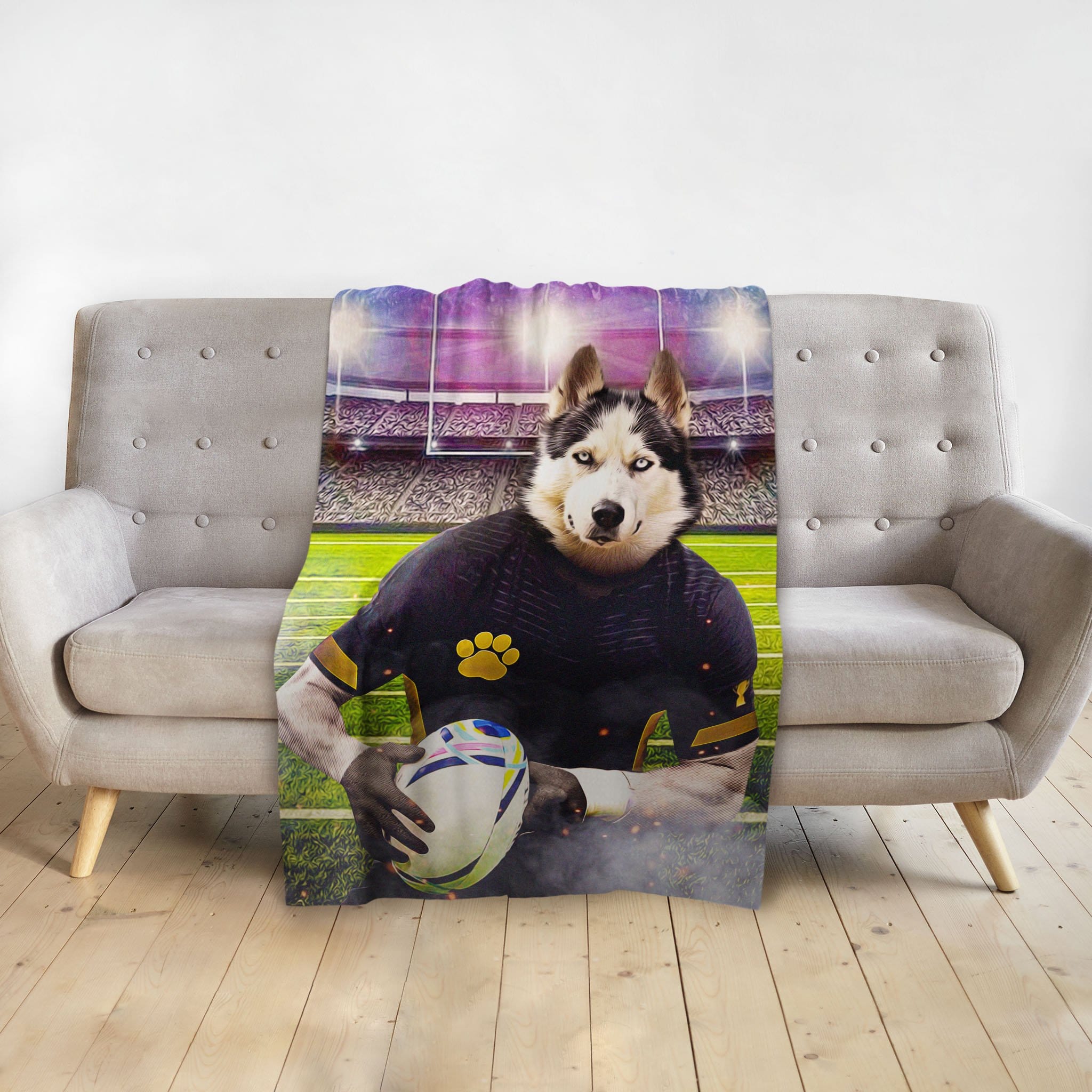 Personalized pet blanket with a husky dog in a rugby player portrait on a couch.