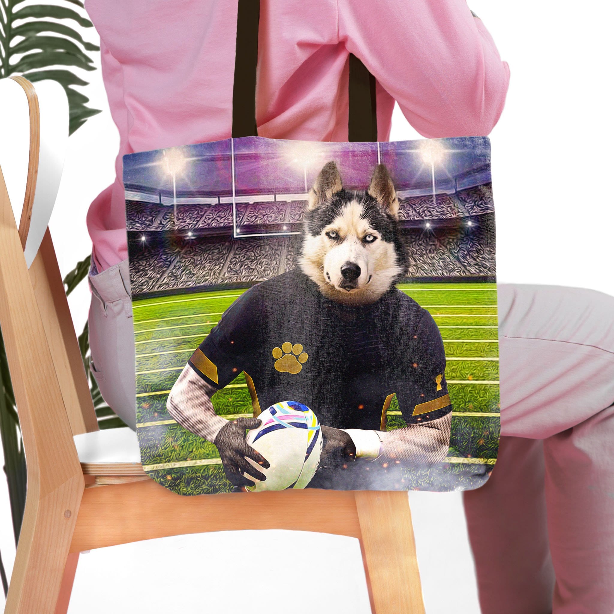 Personalized tote bag with a husky pet portrait as a rugby player in a stadium.