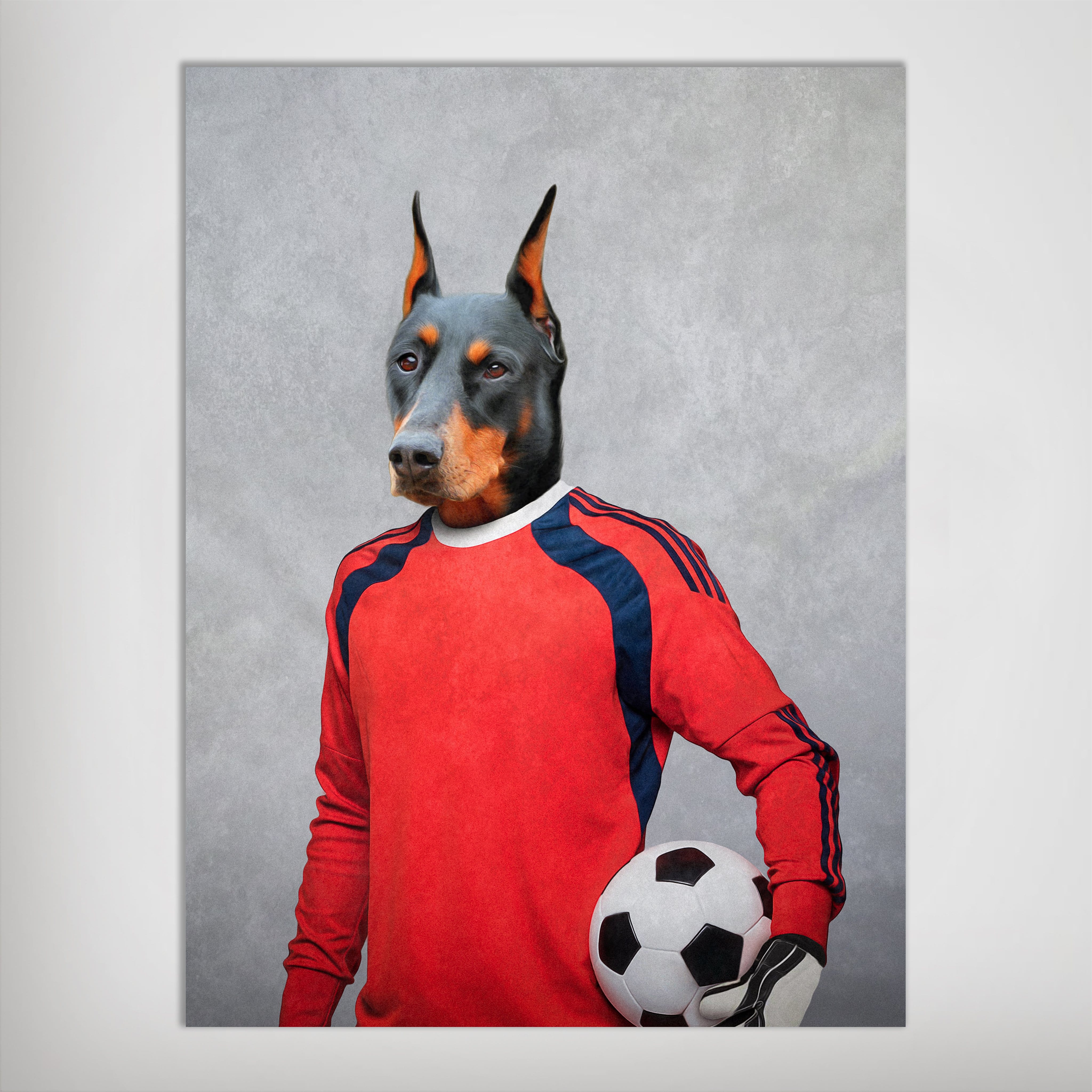Personalized Doberman pet poster as a soccer goalie in a red jersey, holding a black and white ball.