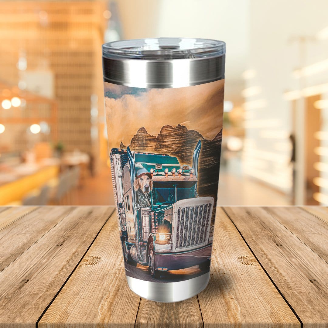 Personalized stainless steel tumbler with a custom dog portrait driving a semi-truck against a mountain sunset.