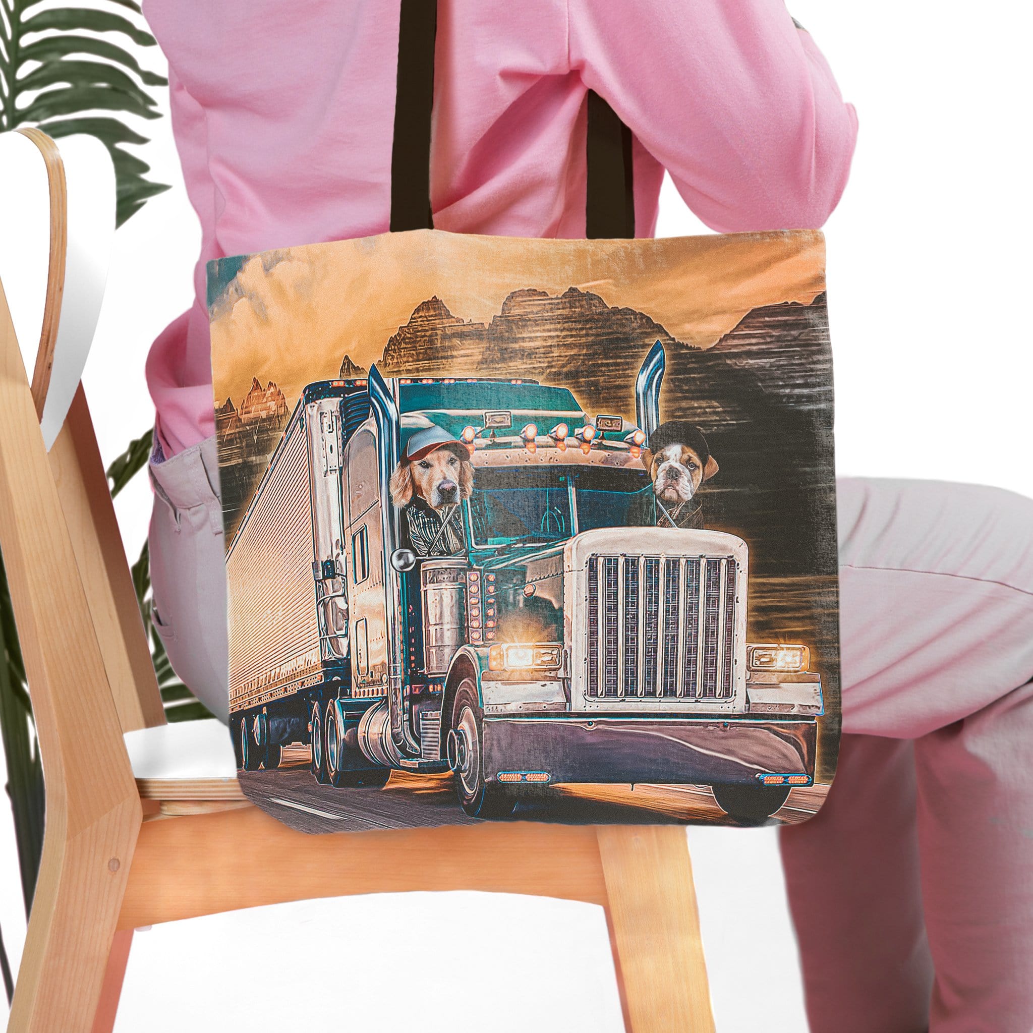 Personalized pet portrait tote bag featuring two dogs in a semi-truck, with a mountain background.