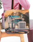 Personalized pet portrait tote bag featuring two dogs in a semi-truck, with a mountain background.
