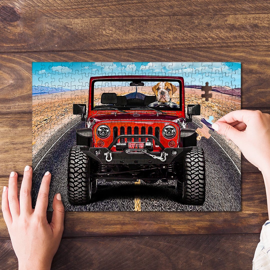 Personalized pet puzzle featuring a bulldog driving a red Jeep on a desert road, with hands assembling it.