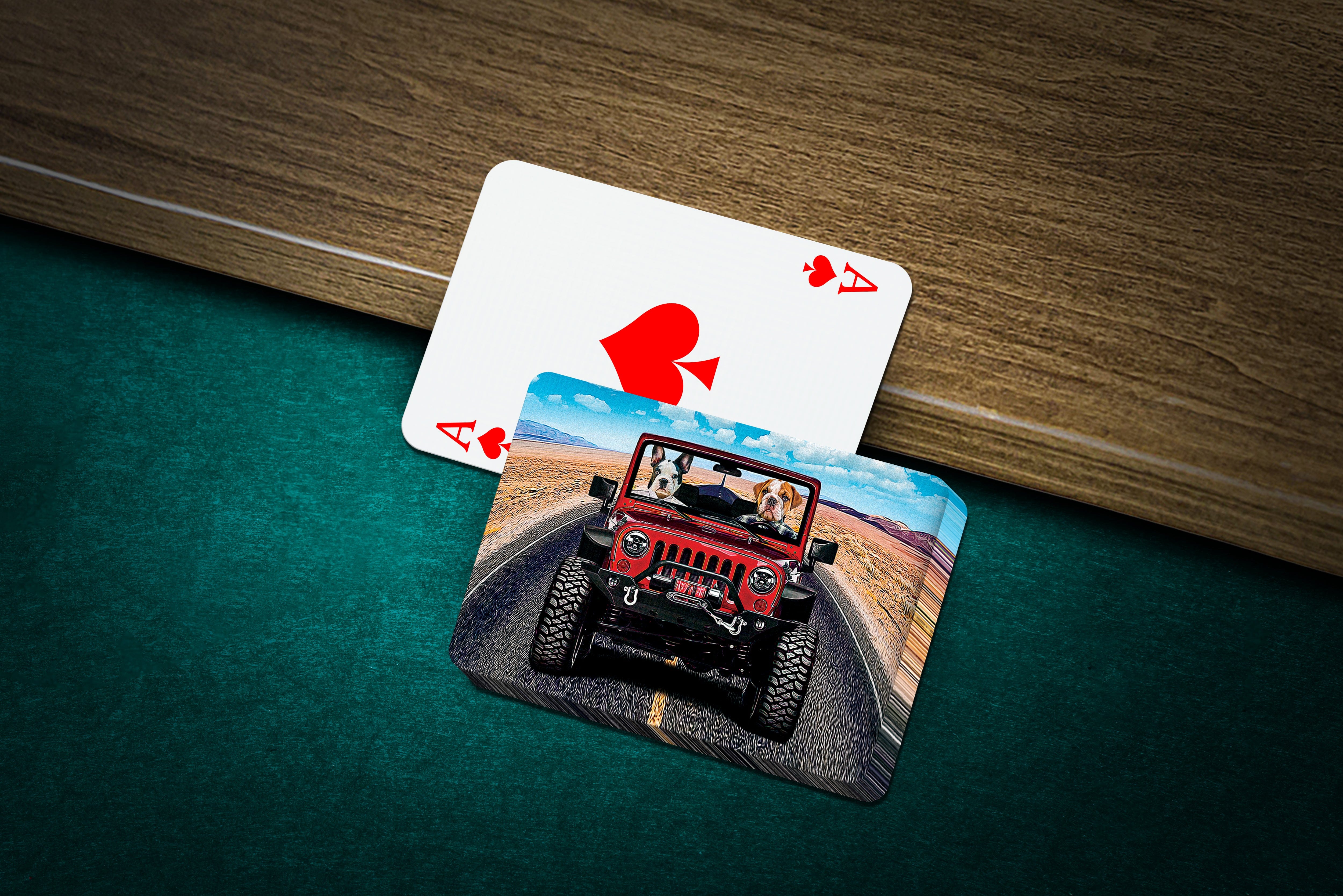 Personalized playing cards featuring two dogs in a red jeep, with an ace of spades card.