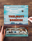 Personalized 2 pet puzzle featuring two dogs in a car, titled 'Thelmutt & Borkise', with a desert landscape.