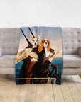 Personalized minky blanket with two dogs in Titanic-style renaissance portraits on a light gray sofa.