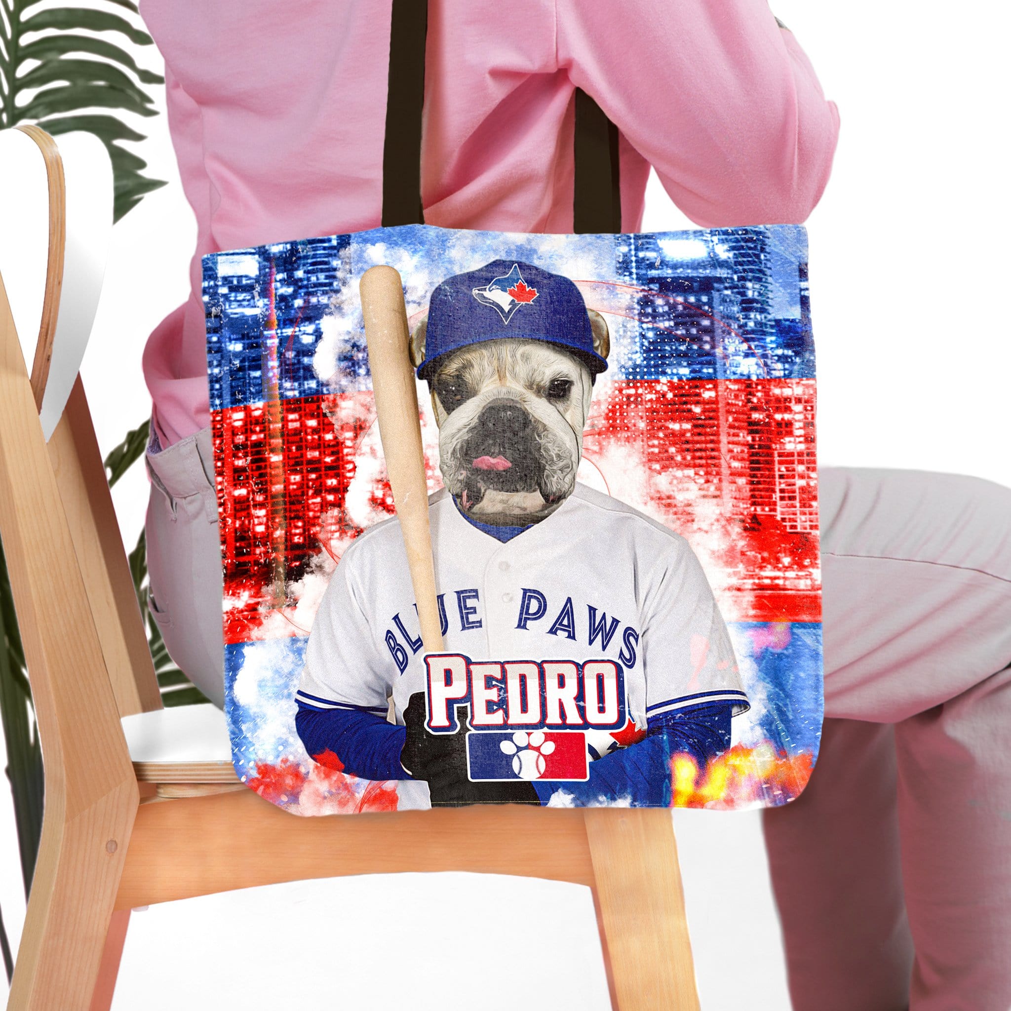 Personalized tote bag with a custom pet portrait of a bulldog in a Toronto Blue Jays baseball uniform.