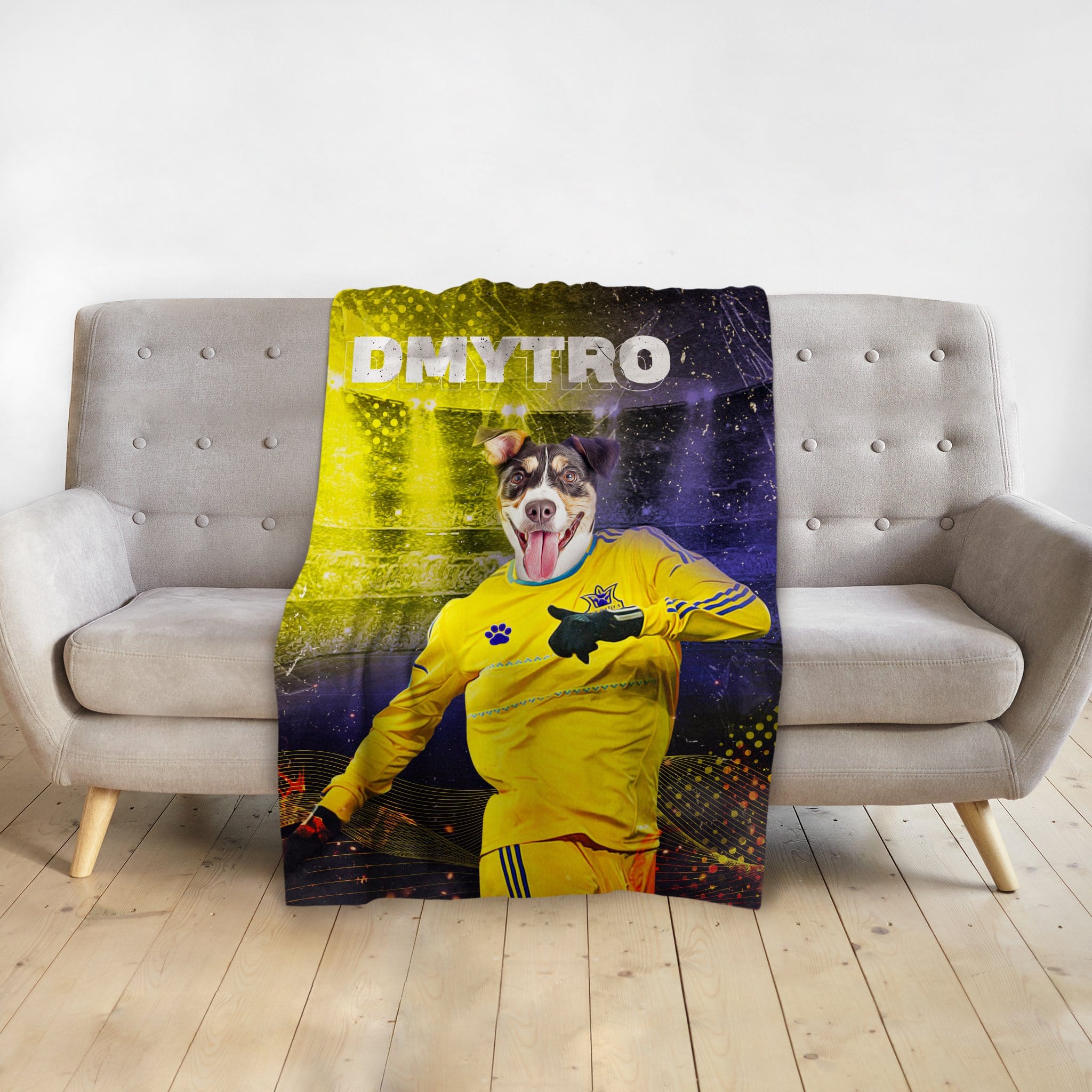 Personalized pet blanket with a dog's head on a Ukrainian football player's body, yellow and blue background.