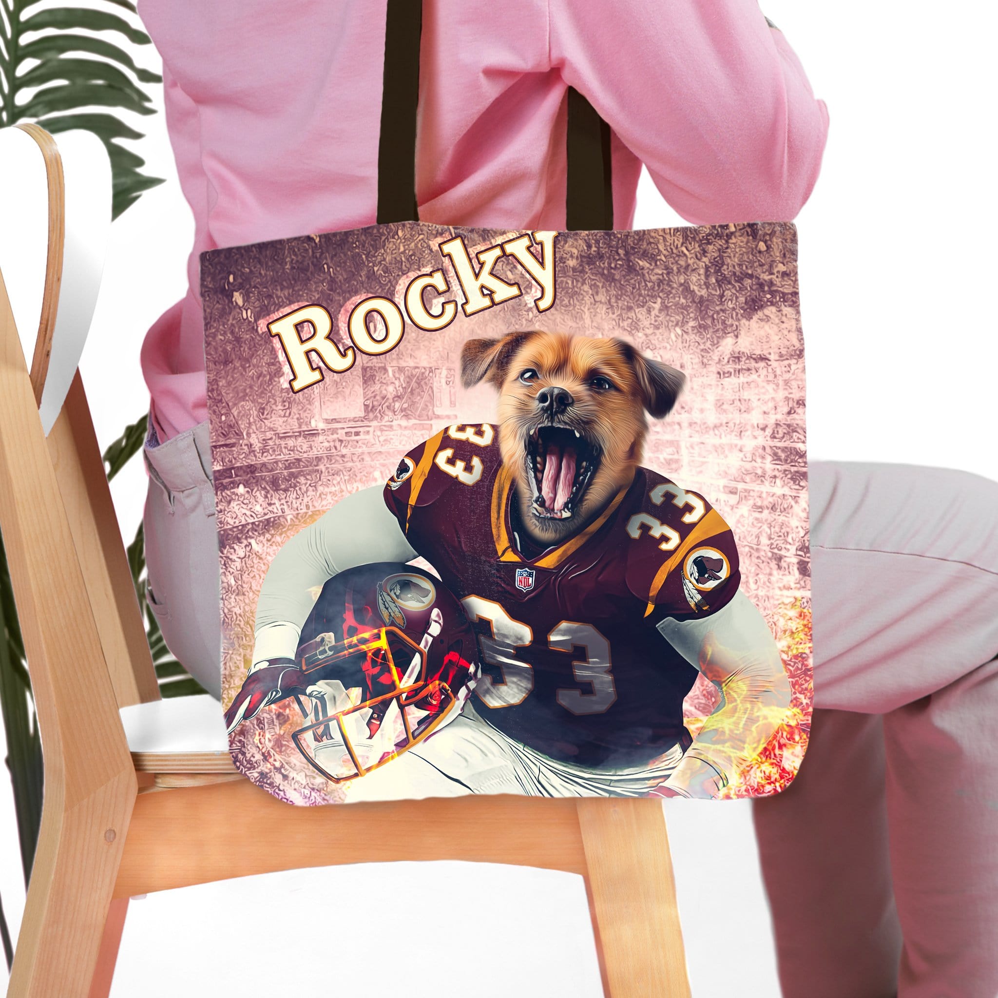 Personalized tote bag with a custom pet portrait of a dog in a football uniform.