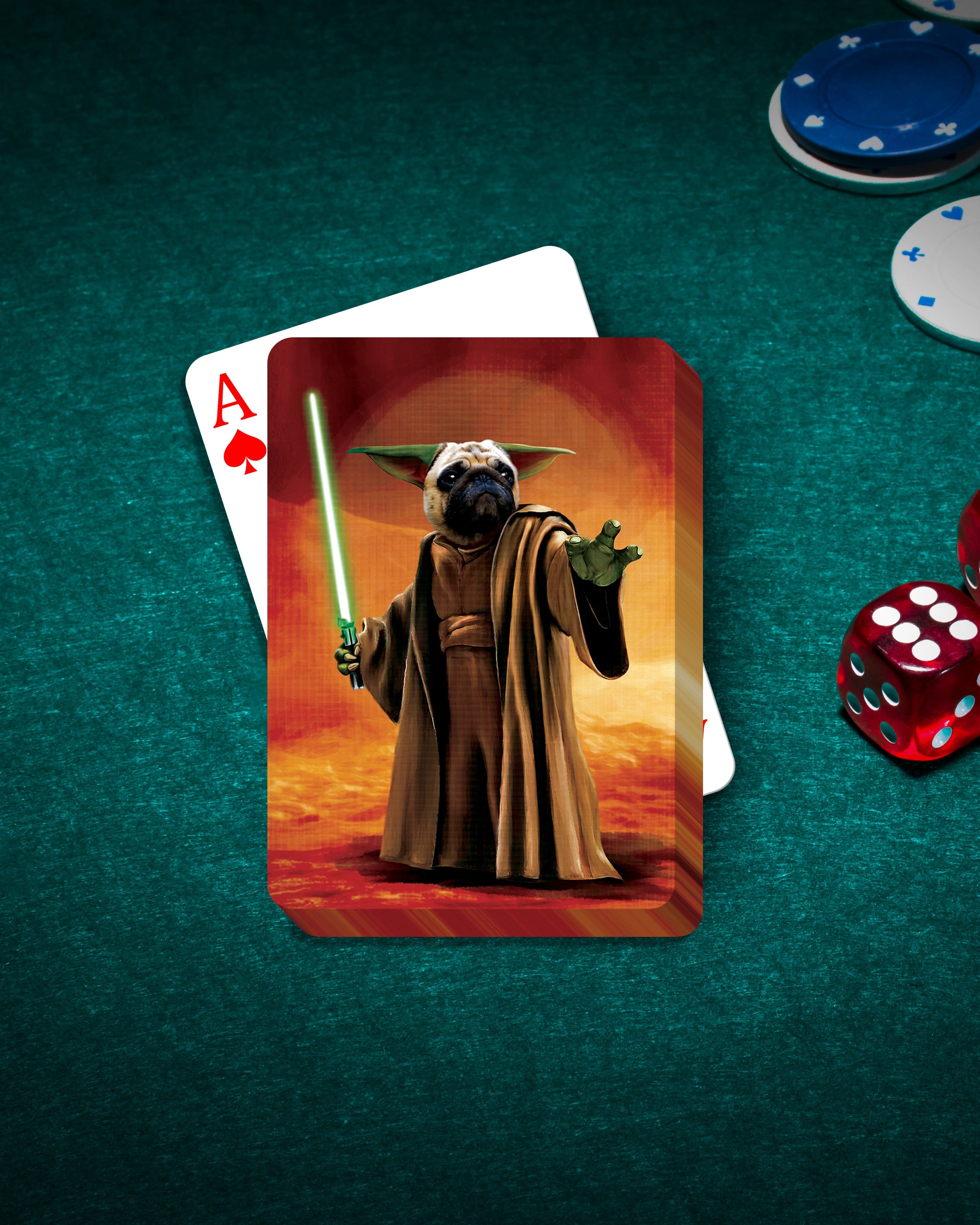 Personalized Yodogg playing cards featuring a custom pet portrait of a pug as a Jedi, on a green felt table with chips and dice.